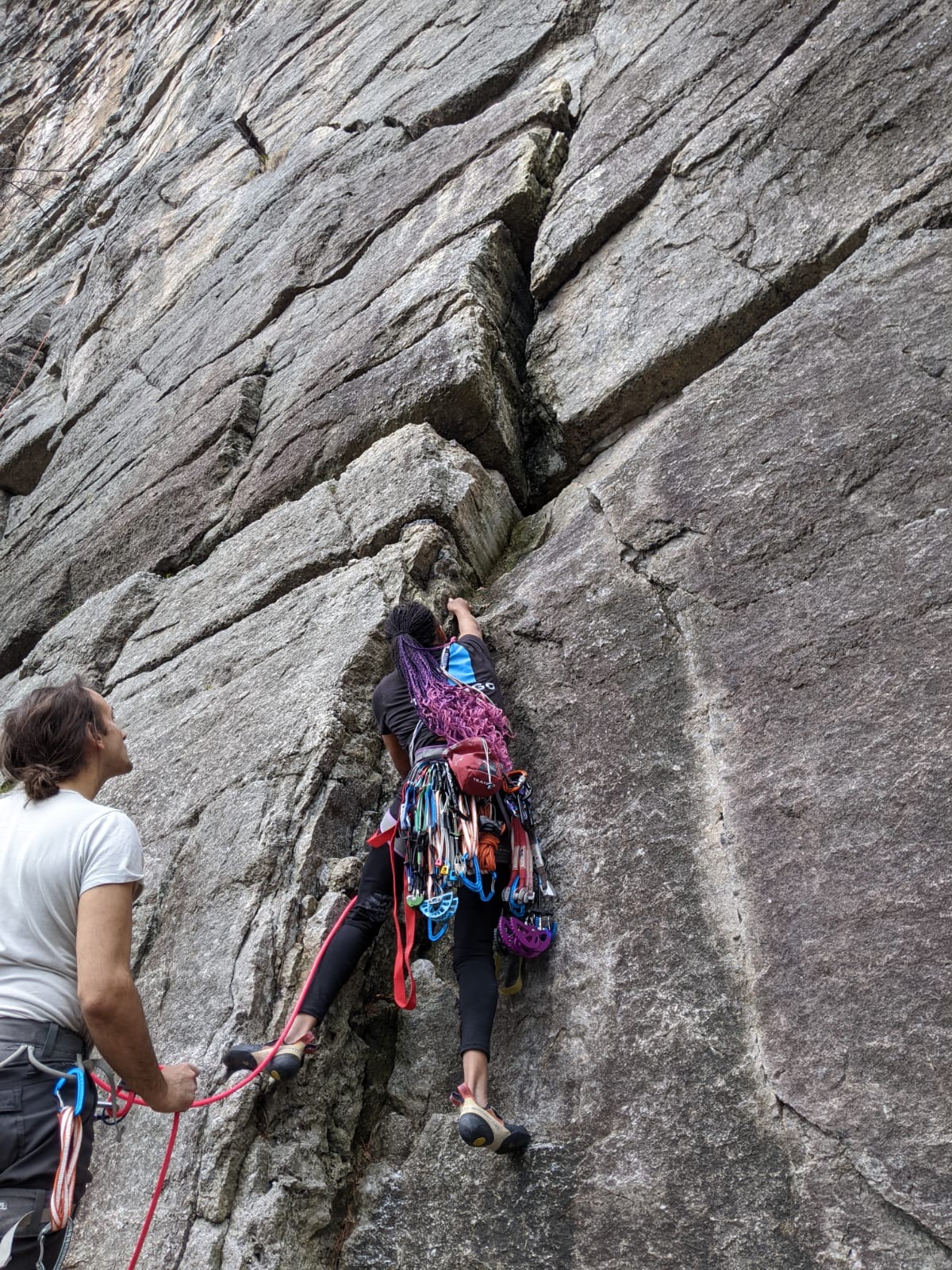 Melissa placing a piece at the beginning of the climb